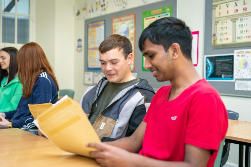 Dundee high School students Conor Arbuckle and Rishabh Akula on Exam day. 