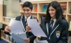 Twins Camran and Sarah Kouhy were among the Madras College pupils to open their results in front of television cameras. Image: Steve Brown/DC Thomson.