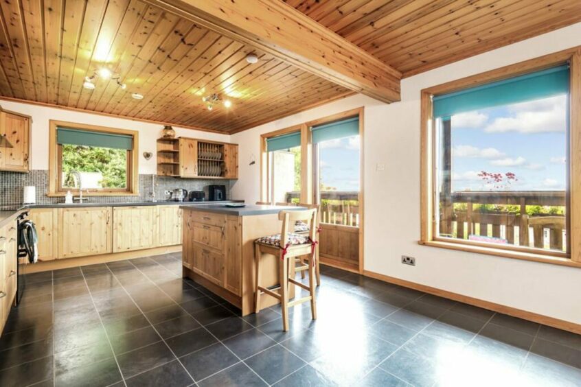 The kitchen at the Aberdour home also features a private balcony. 