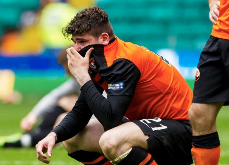 A devastated Nadir Ciftci of Dundee United at full-time of the 2014 Scottish Cup final