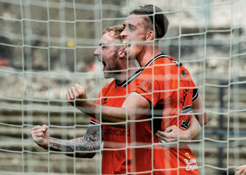 Kevin Holt and Declan Gallagher of Dundee United 