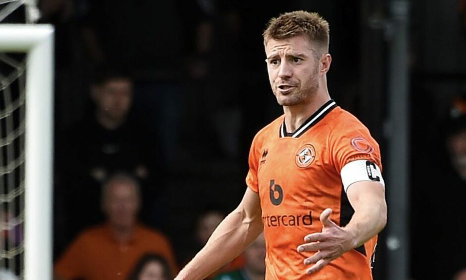 Ross Docherty in action for Dundee United in Ayrshire.