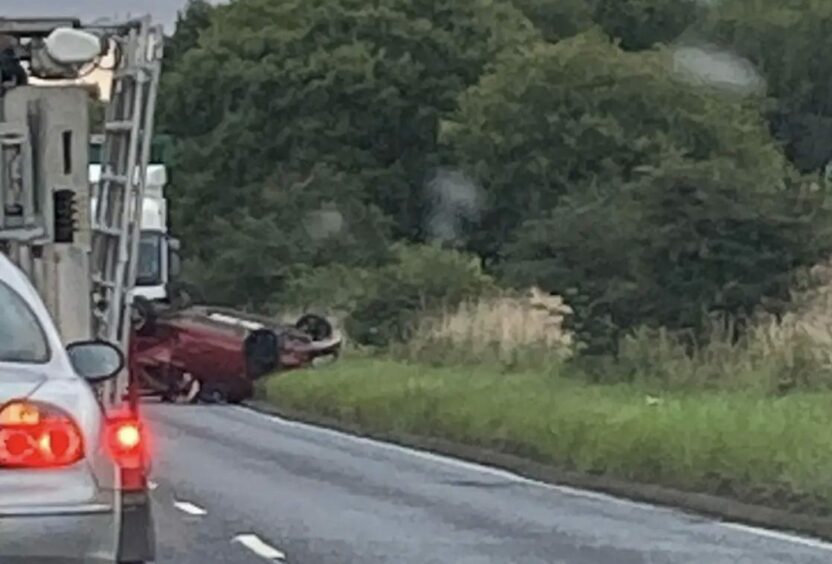 image of the car which overturned on A915 Standing Stane Rd near Kirkcaldy.