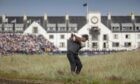 Tiger Woods hits an approach to the 18th during the 147th Open Championship at Carnoustie in 2018. Image: SNS