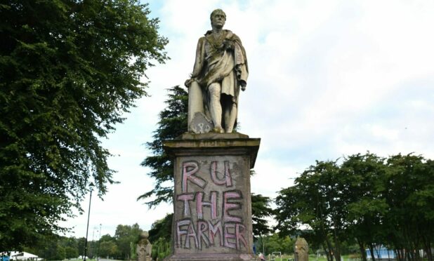 The defaced Sir Walter Scott monument in Perth.