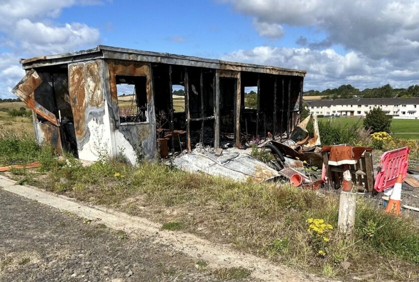 The gutted portable cabin which was destroyed in the first fire at the Willow Crescent site in Rosyth.