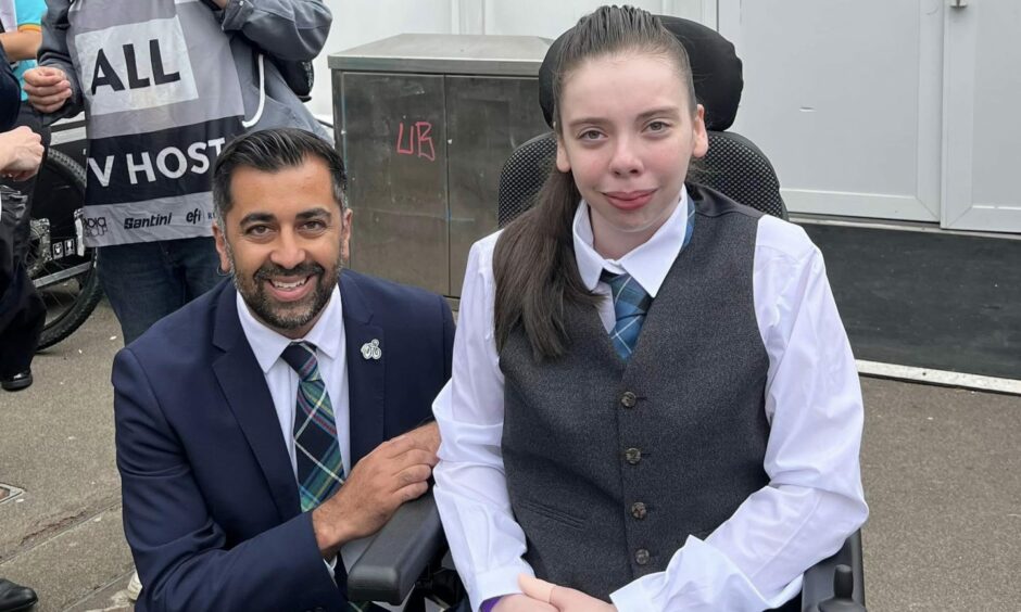 Katie Robertson - AKA the Wheeled Piper - with First Minister Humza Yousaf at the launch of the UCI Cycling World Championships in Glasgow
