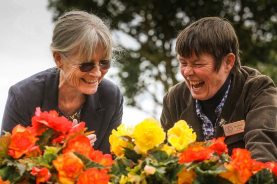 Judges Mary Bagley and Geraldine King enjoy a laugh in the gardens at East Haven. Image: Mhairi Edwards/DC Thomson