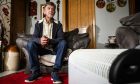 Bruce Lamb has faced a long wait for a new heating system. Image: Mhairi Edwards/DC Thomson