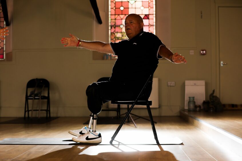 Double amputee Martin Short attends a weekly chair yoga class at Heart Space in Dundee