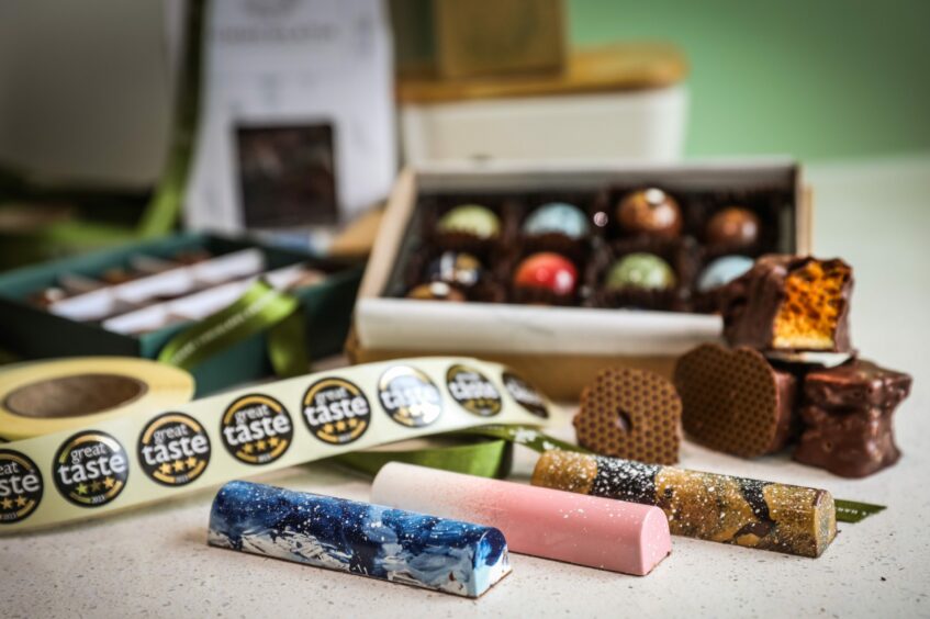A range of Chocolatia products next to the coveted black Great Taste stickers.