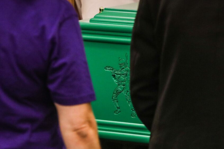 A Jedi knight carved into the coffin of Darien Baird at his funeral in Brechin