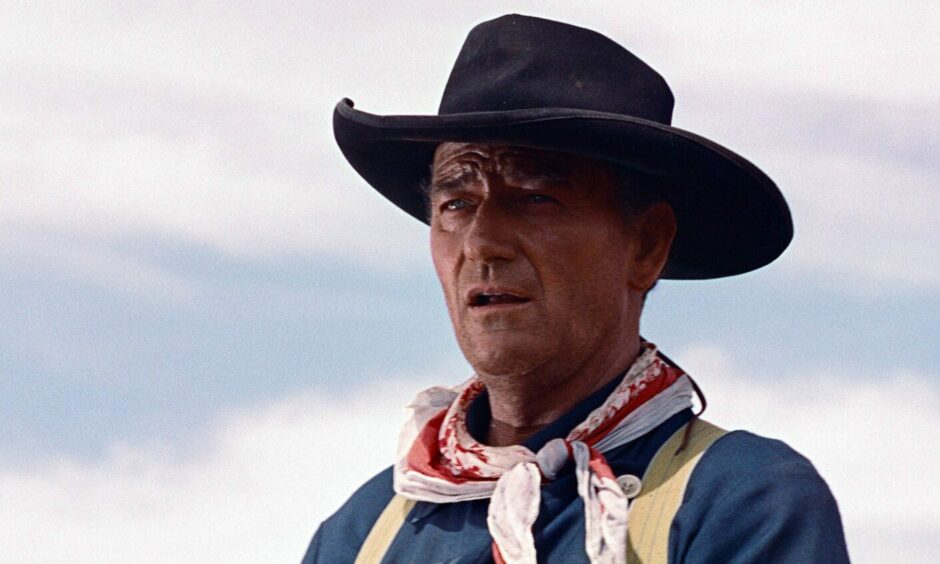 Movie legend John Wayne arrived in his Stetson during the glory years of Perth Bull Sales. Image: Shutterstock.
