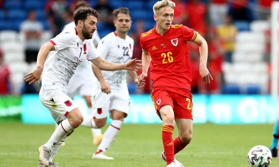 St Johnstone midfielder Matt Smith playing for Wales against Albania.