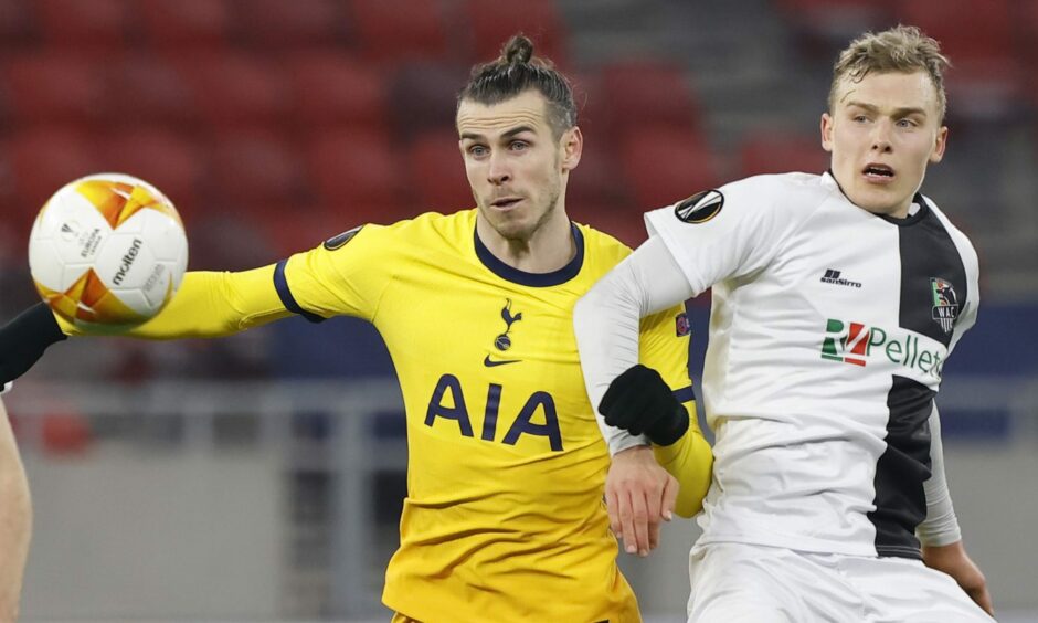 Sven Sprangler battles with Gareth Bale when Wolfsberger took on Spurs.