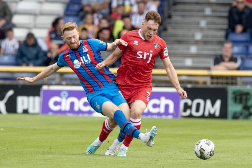 Dunfermline FC defender Josh Edwards is tackled by David Carson in a game against Inverness Caley Thistle earlier this season.