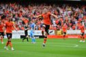 Declan Glass celebrates notching Dundee United's decisive third goal against Dunfermline in September