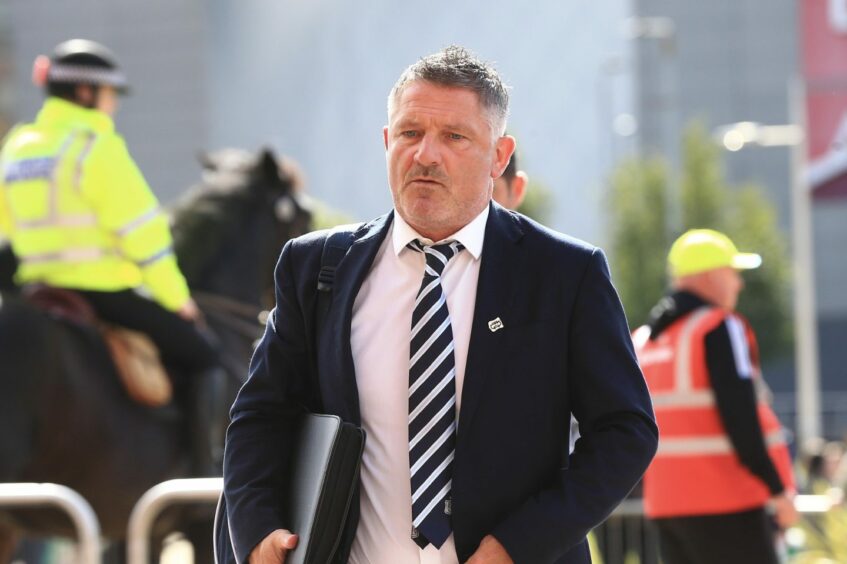 Tony Docherty arrives at Celtic Park. Image: Shutterstock