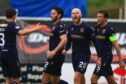 Zak Rudden celebrates his late, late leveller. Image: David Young/Shutterstock