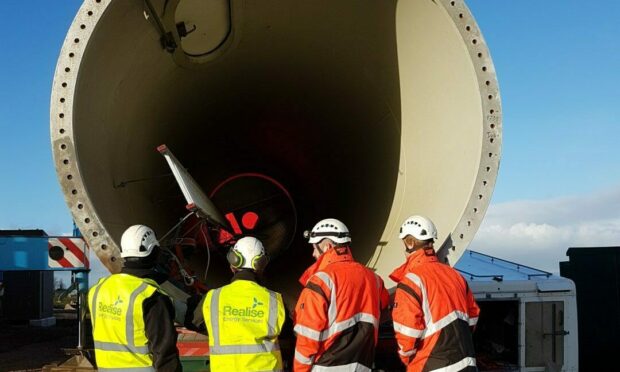 Realise Energy Services manages and maintains wind turbines. Image:  Realise Energy Services.