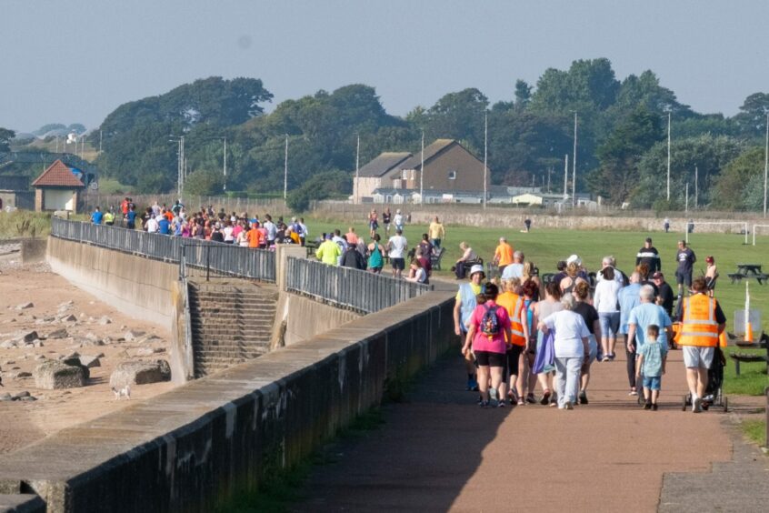 People participating in West Links parkrun in Arbroath.