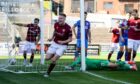 Aaron Steele celebrates his first goal for Arbroath. Image: SNS.
