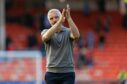 Jim Goodwin applauds Dundee United fans after his side's SPFL Trust Trophy win over Dunfermline. Image: Ross Parker/SNS