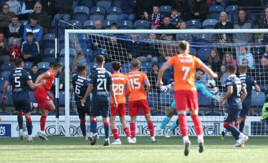 Kevin Dabrowski saves from Morgan Boyes. Image: SNS.