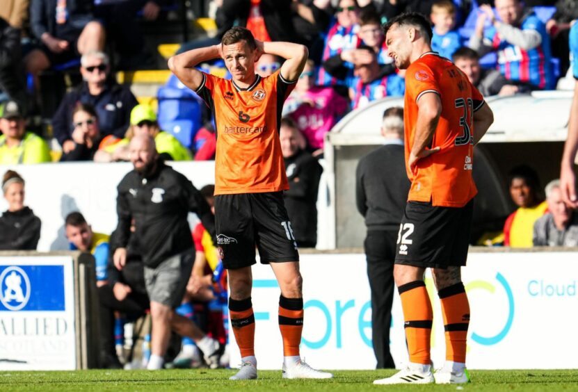 Jordan Tillson is shown a red card for Dundee United 