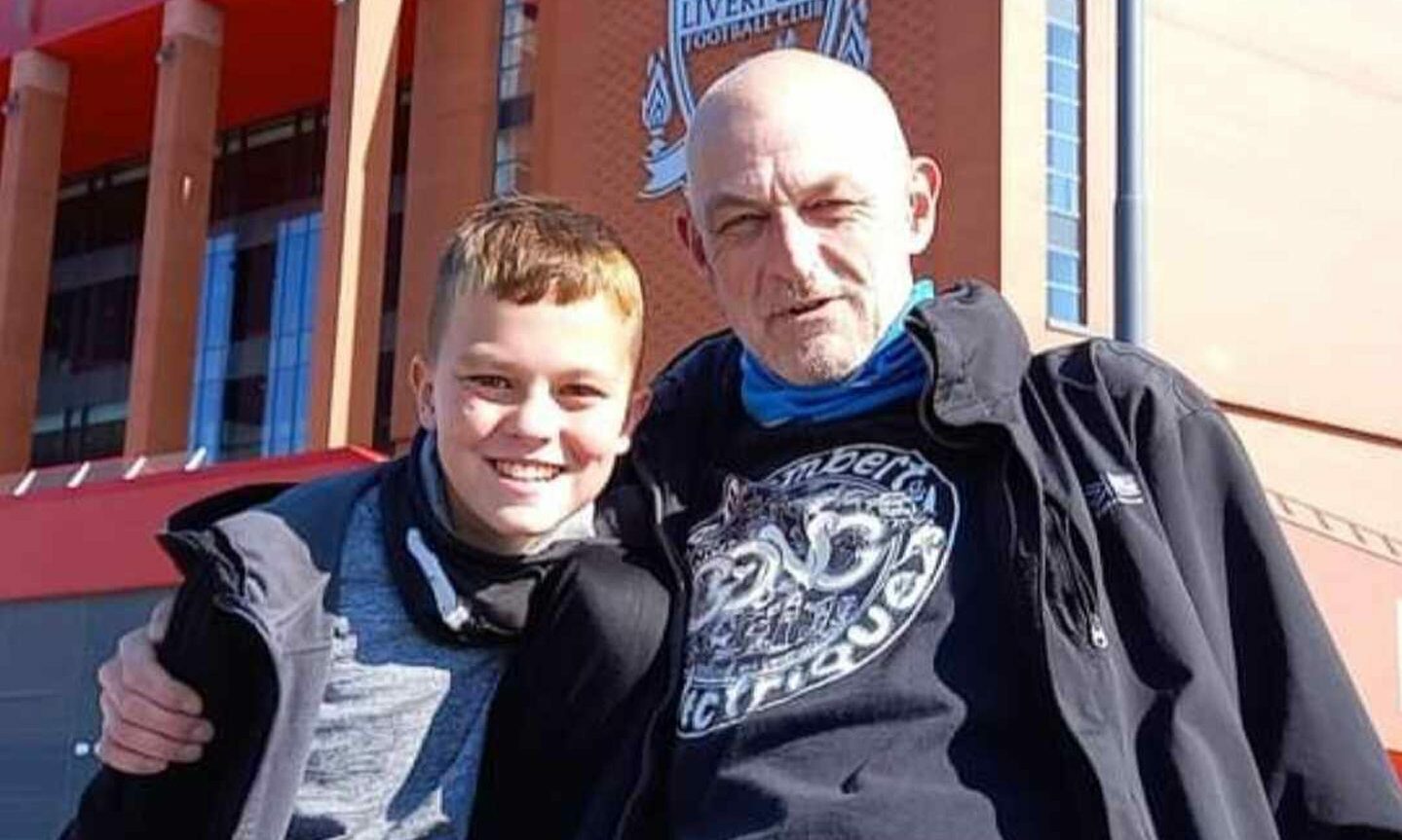 Dundee dad Jay Cannell with son James outside Anfield in Liverpool