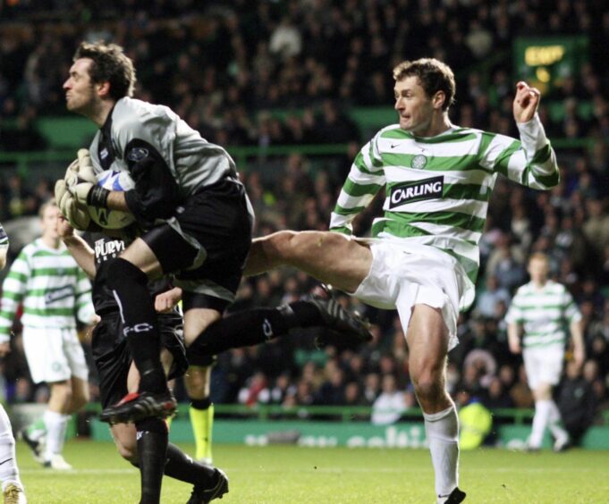 Dunfermline's Allan McGregor is challenged by Chris Sutton of Celtic. Image: SNS.