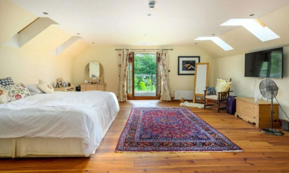 Bedroom one in Old Mill House, Errol.