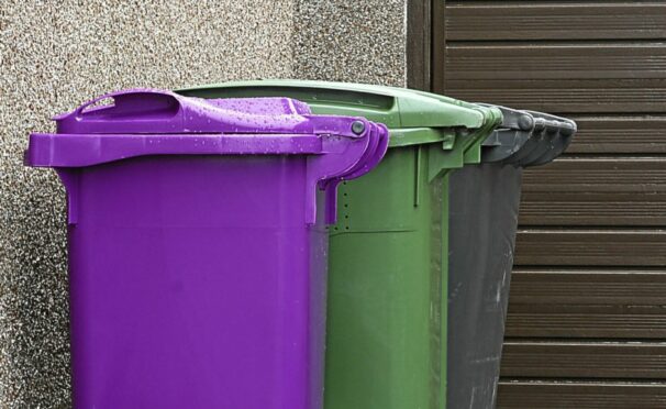 A blue bin for paper and cardboard will be added to the Angus kerbside line-up but glass will not be collected. Image: DC Thomson