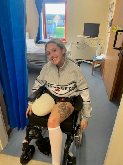 Chantelle pictured in hospital after her leg was amputated due to cancer.