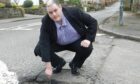 Christopher Rennie was a Liberal Democrat council hopeful who pledged to tackle Perthshire's potholes.
