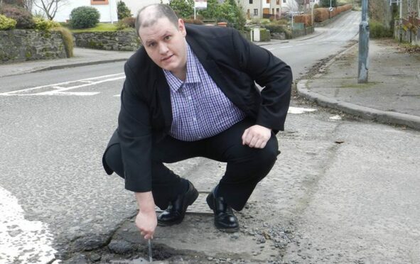 Christopher Rennie was a Liberal Democrat council hopeful who pledged to tackle Perthshire's potholes.