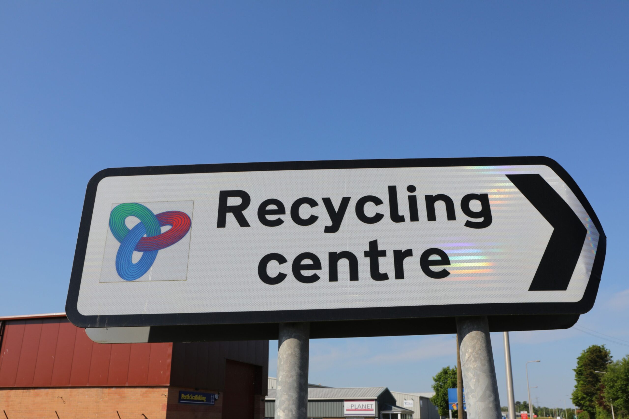 A Recycling centre road sign