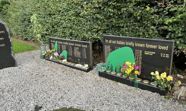 Baby memorial stones in Dunfermline cemetery vandalised with green paint.
