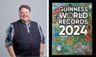 Editor Craig Glenday, from Dundee, and the Guinness World Records 2024 boo