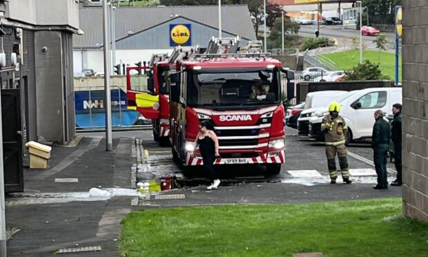 Fire engines outside the Elders Court multi in Lochee, Dundee, due to an ongoing incident