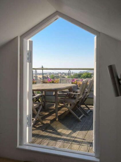 The lofts leads to the rooftop decking at the costal Fife apartment 