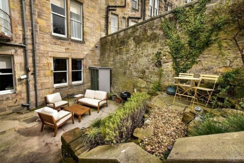The outdoor courtyard to the rear of the St Andrews flat