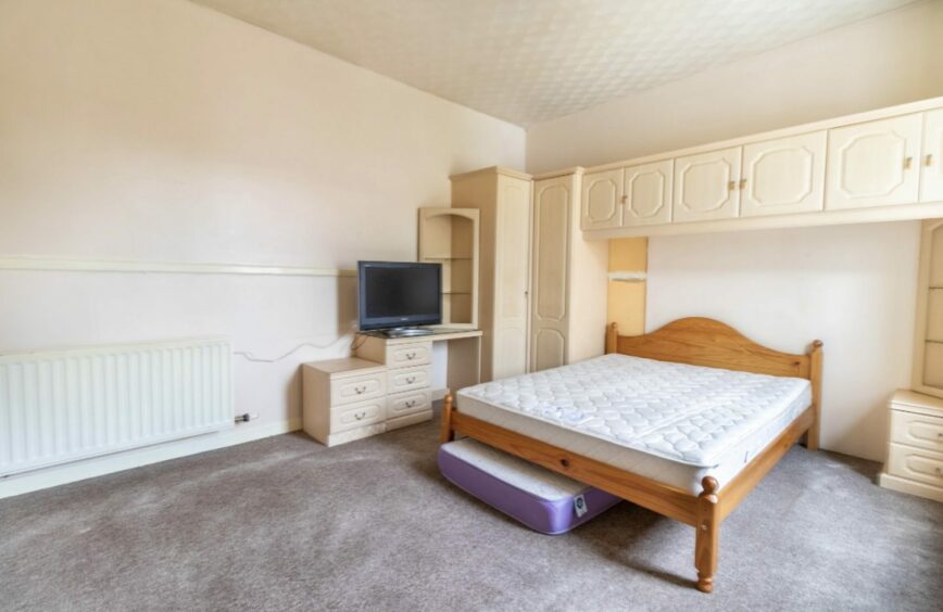 The main bedroom of the flat above the Park Bar in Brechin