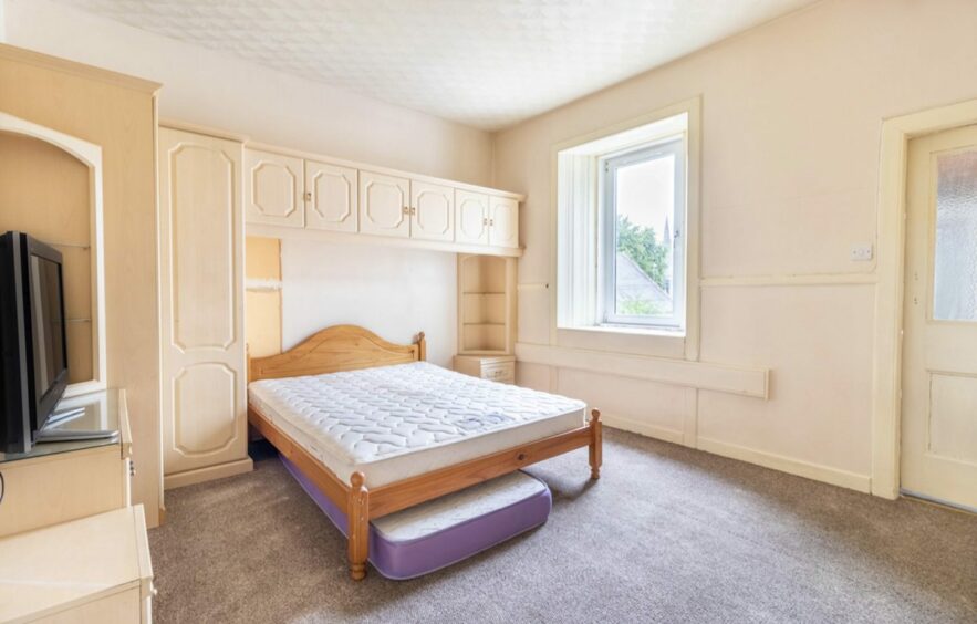 The main bedroom of the flat above the Park Bar in Brechin