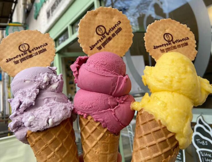 Three purple, pink and yellow ice creams outside Jannettas Gelateria.