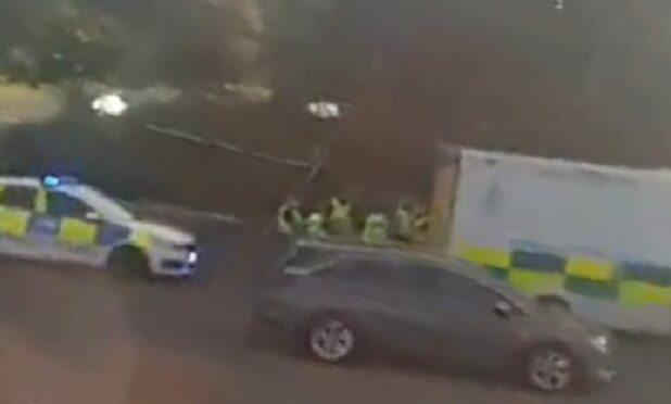 Police and ambulance on Coupar Angus Road, Dundee, close to the Harefield Road roundabout.