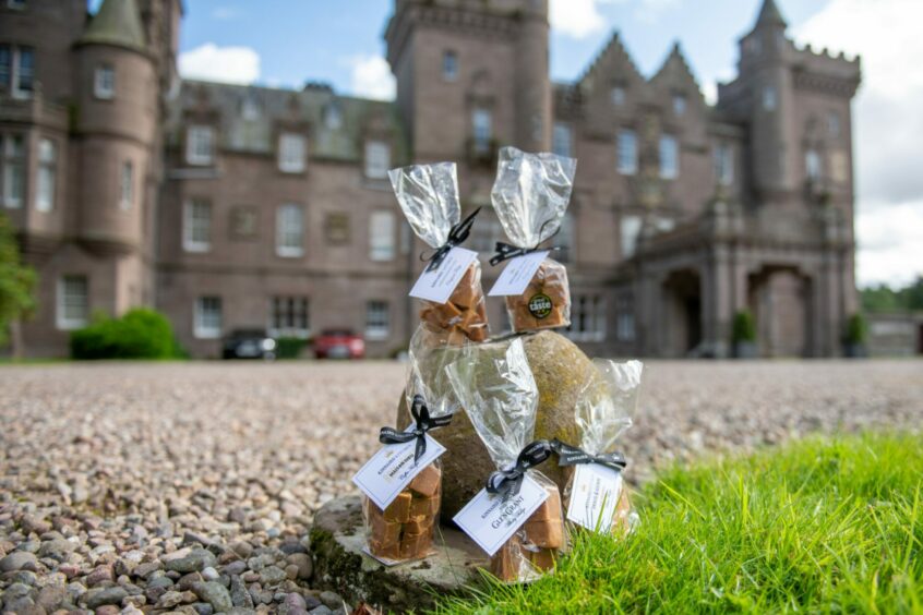 Bags of fudge in front of Kinnaird Castle outside Brechin.