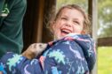 Young visitor Arabella Richardson handles one of the ferrets at Murton. Imager: Kim Cessford/DC Thomson