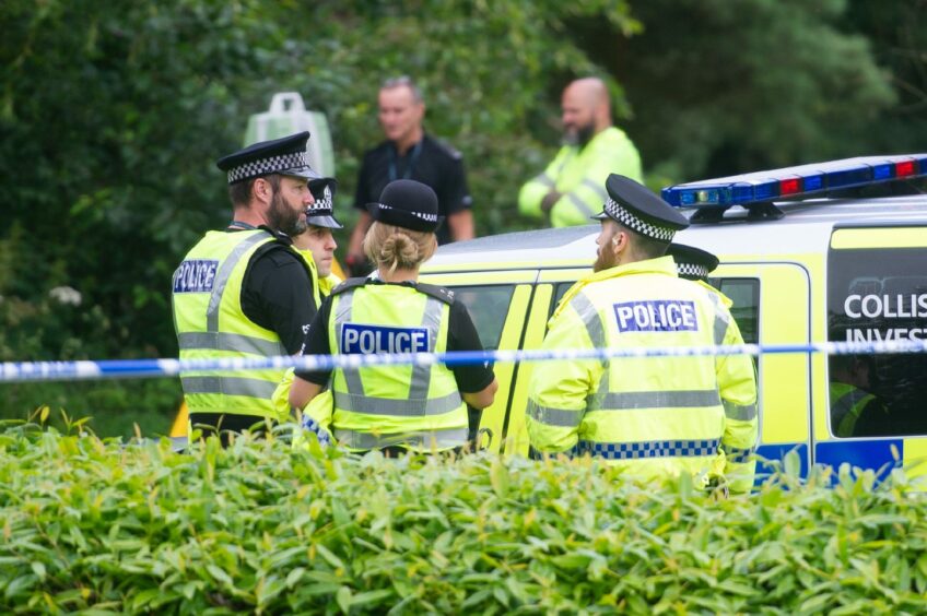 Police at the A911 crash site