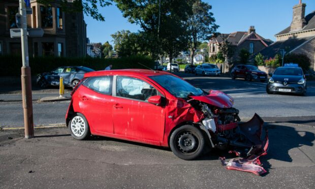 A red car was involved in the crash.